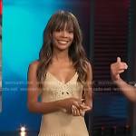 Zuri’s beige eyelet mini dress on Access Hollywood