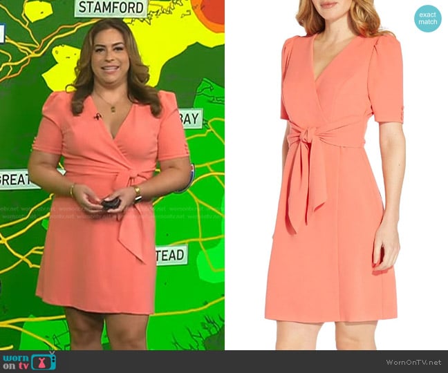 Adrianna Papell Crepe Tie Front Short Wrap Dress in Peach Blossom worn by Violeta Yas on NBC News Daily