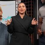 Adrienne’s black blazer and mini skirt on E! News