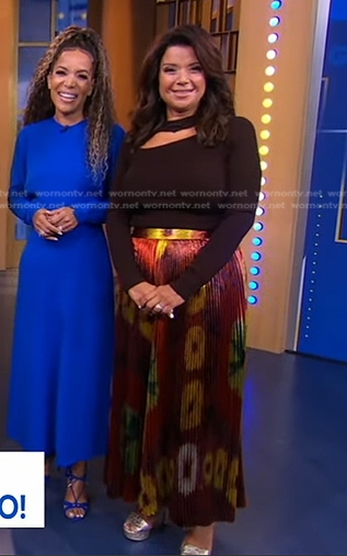 Ana Navarro’s brown cutout top and pleated skirt on Good Morning America