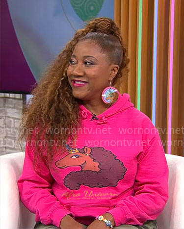 April Showers’ pink Afro Unicorn hoodie on CBS Mornings