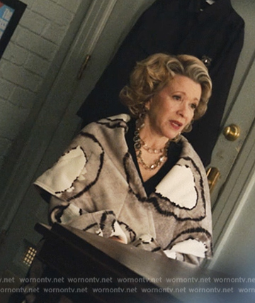 Donna's gray and white wrap coat on Only Murders in the Building
