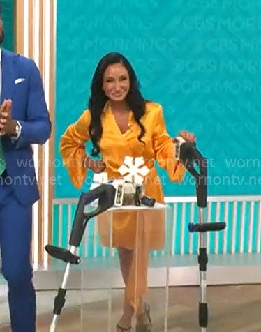 Elizabeth Werner's orange draped wrap dress on CBS Mornings