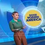 Eva’s green polo and brown belted pants on Good Morning America