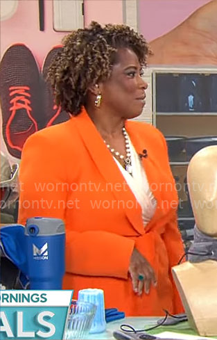 Gayle Bass' orange tie waist blazer on CBS Mornings