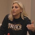 Gina’s black Versace sweatshirt on The Real Housewives of Orange County