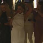 Jennifer’s white satin asymmetric mini dress on The Real Housewives of Orange County