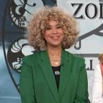 Lauren Messiah’s green blazer on Access Hollywood