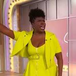 Leslie Jones’ lime leather jacket and belted dress on Sherri