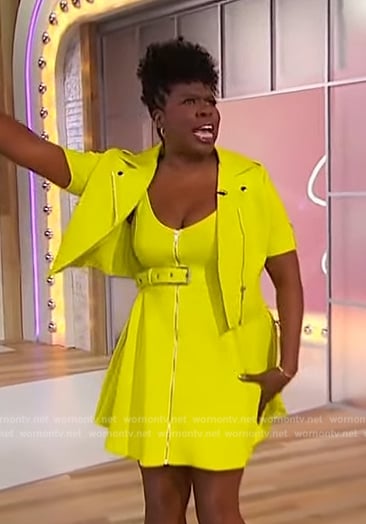 Leslie Jones' lime leather jacket and belted dress on Sherri