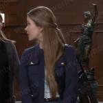 Molly’s navy jacket with gold buttons on General Hospital