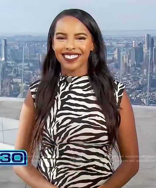 Mona’s zebra stripe dress on Extra