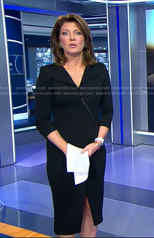 Norah’s black zip front sheath dress on CBS Evening News