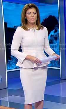 Norah's light pink peplum jacket and pencil skirt on CBS Evening News