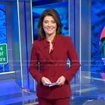 Norah’s red double breasted blazer and pants on CBS Evening News