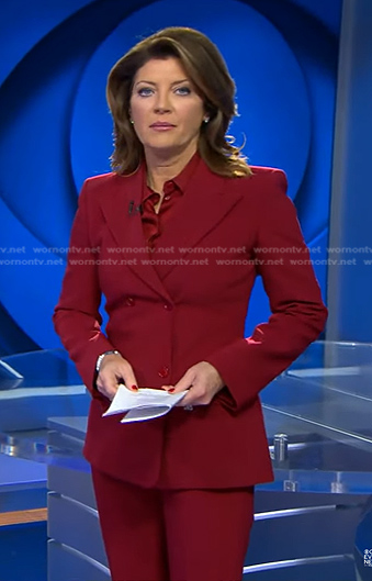 Norah’s red double breasted blazer and pants on CBS Evening News