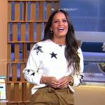 Rocsi Diaz’s white star print sweater and brown pants on Good Morning America