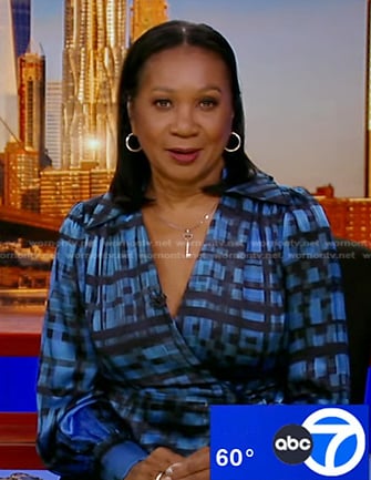 Sandra Bookman’s blue plaid wrap dress on Good Morning America