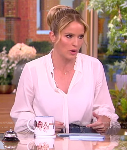 Sara's white tie neck blouse and denim skirt on The View
