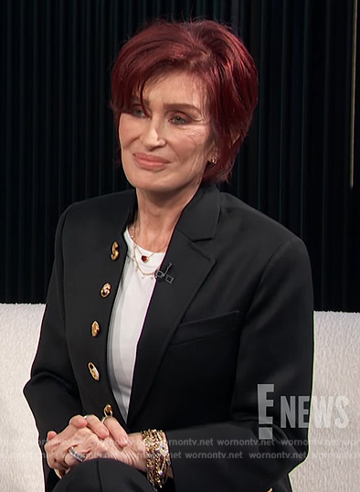 Sharon’s black embellished button blazer on E! News