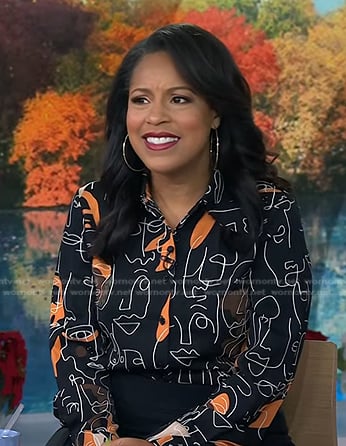 Sheinelle’s black face print blouse on Today