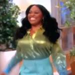 Sherri Shepherd’s metallic blouse and mini skirt on The View