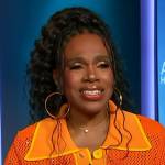 Sheryl Lee Ralph’s orange mesh shirt on Access Hollywood