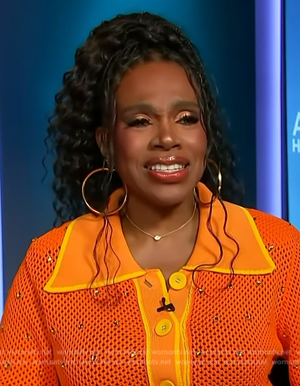 Sheryl Lee Ralph’s orange mesh shirt on Access Hollywood