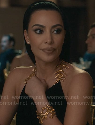 Siobhan's halter gown with gold detail on American Horror Story Delicate