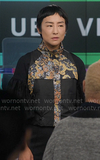 Stella's black floral inset print top on The Morning Show