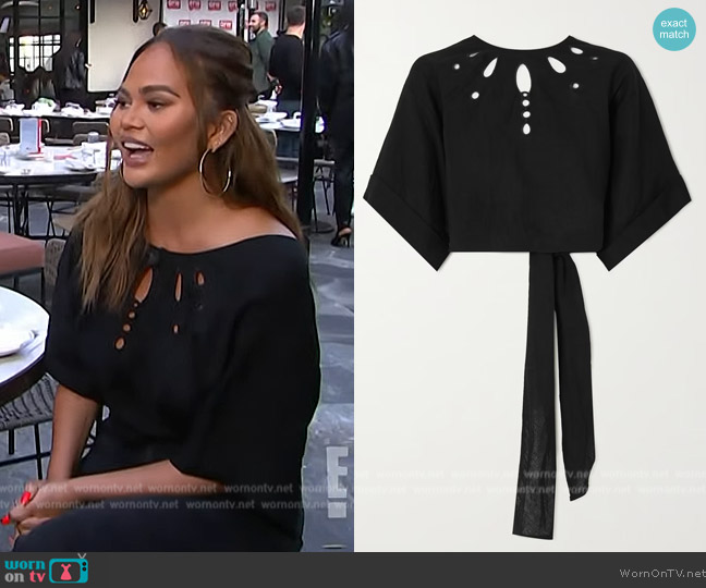 Three Graces London Zelda tie-detailed cutout linen top worn by Chrissy Teigan on E! News