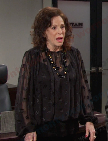 Vivian's black sheer blouse on Days of our Lives
