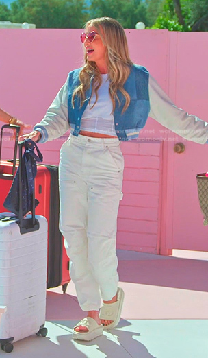 Whitney's blue colorblock bomber jacket and white pants on The Real Housewives of Salt Lake City