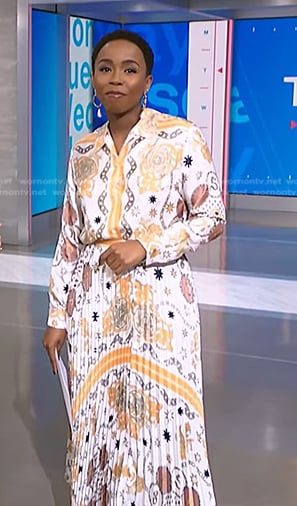 Zinhle’s white print shirt and pleated skirt on NBC News Daily