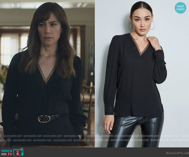 Wendy’s black embroidered trim blouse on Billions