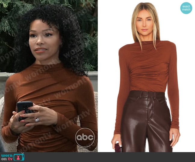 Enza Costa x Revolve Jersey Twist Top in Cognac worn by Portia Robinson (Brook Kerr) on General Hospital