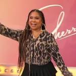 Angela Yee’s leopard print cardigan and mini skirt on Sherri