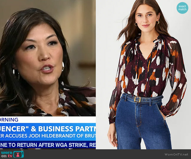 Ann Taylor Abstract Animal Print Shirred Raglan Sleeve Top worn by Juju Chang on Good Morning America