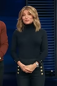 Kit’s black turtleneck sweater on Access Hollywood