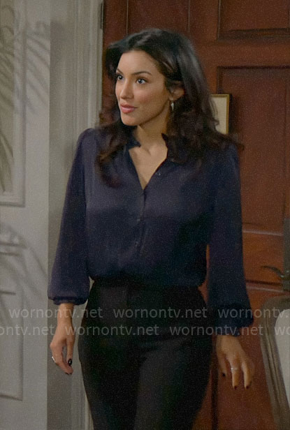 Audra's navy ruffled button front blouse on The Young and the Restless
