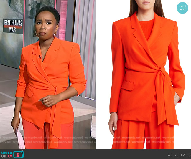 Zinhle Radiates in Chic Orange Wrap Blazer on NBC News Daily! | WornOnTV