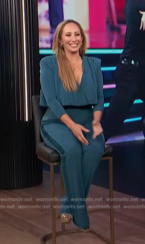 Cheryl Burke's teal v-neck jumpsuit on E! News