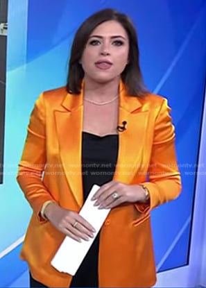 Chloe Melas's orange satin blazer on NBC News Daily