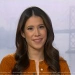 Deirdre’s orange ribbed top on NBC News Daily