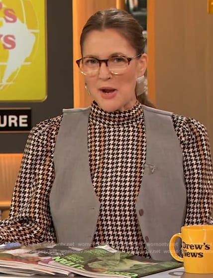 Drew's houndstooth print blouse and leather skirt on The Drew Barrymore Show