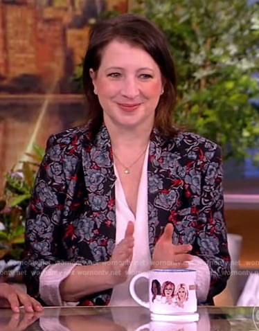 Elle Key's black floral print blazer on The View