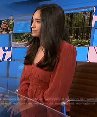 Emilie Ikeda's orange smocked waist top on NBC News Daily