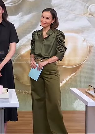 Eva’s green satin blouse and flare pants on Good Morning America