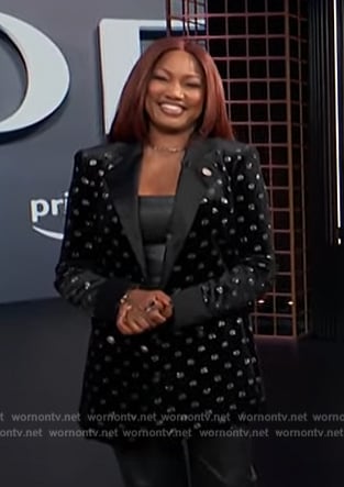 Garcelle’s black embellished blazer on E! News