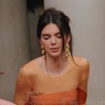 Kendall’s orange long sleeved gown on The Kardashians